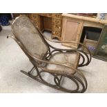 A VINTAGE BENTWOOD ROCKING CHAIR