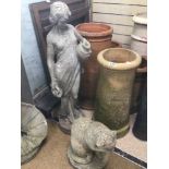 A CONCRETE GARDEN FIGURE OF A LADY CARRYING A WATER JUG WITH A SEATED CONCRETE CAT LARGEST 92CM