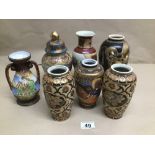A QUANTITY OF POLYCHROME ORIENTAL VASES LARGEST 20CMS