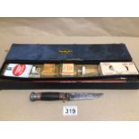 A VINTAGE B S A GUN CLEANING KIT WITH A VINTAGE KNIFE