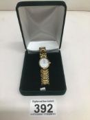 A LONGINES GOLD PLATED AND STAINLESS STEEL LADIES BRACELET WATCH REF L6200 2 WHITE DIAL CABOUCHON