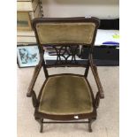 A VICTORIAN PERIOD INLAID ARM CHAIR WITH TURNED OUT LEGS
