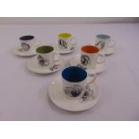 A set of six Susie Cooper bone china coffee cups and saucers with fruit motifs