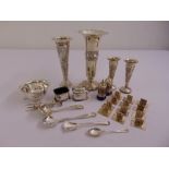 A quantity of silver and white metal to include, vases, condiments, a dish, place card holders and