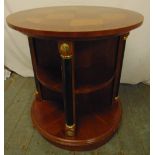 A mahogany cylindrical inlaid revolving bookcase with gilt metal mounts