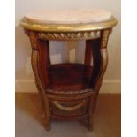 An oval side table with marble inset top and bergere panels to the sides, A/F