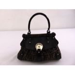 Fendi ladies handbag with stamped metal clasp and leather handle