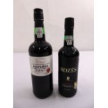 A bottle of Rozes port and another bottle of port