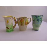 Clarice Cliff Newport Pottery Celtic Leaf and Berry pattern flower jug and two Burleigh ware jugs