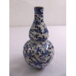 Chinese blue and white bottle vase decorated with leaves and birds, character marks to the base, A/