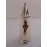 A silver sugar sifter of conical form with pierced pull off cover on raised circular base,