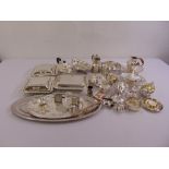 A quantity of silver plate to include trays, teaset, entr‚e dish and covers