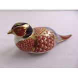 A Royal Crown Derby figurine of a pheasant, marks to the base
