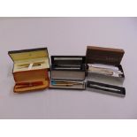 A quantity of pens to include Parker, Fisher, Cross, Lamy and Dunhill, some in original cases (11)