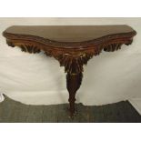 A mahogany demilune wall mounted console table