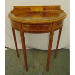An Edwardian mahogany demilune inlaid hall table on four tapering rectangular legs