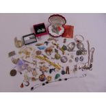 A quantity of costume jewellery to include brooches, earrings, bracelets and earrings