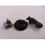 Three Japanese metal figurines of various forms