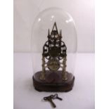 A Victorian brass skeleton clock mounted on oval wooden plinth, to include glass dome and pendulum
