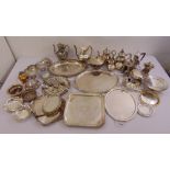A quantity of silver plate to include trays, tea sets, dishes and condiments,