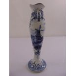 A Delft stem vase decorated with an image of a windmill, leaves and flowers, marks to the base