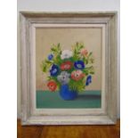 A framed still life of flowers oil on panel, indistinctly signed bottom right, 46 x 38cm