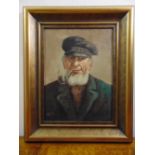 A framed oil on canvas of a fisherman smoking a pipe, indistinctly signed bottom left, 40 x 30cm
