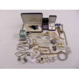 A quantity of costume jewellery to include necklaces, brooches, earrings, bracelets and rings