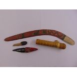 A quantity of Aboriginal collectables to include a boomerang and a quiver (4)