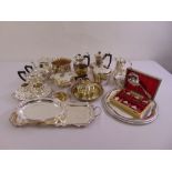 A quantity of silver plate to include trays, dishes and a tea and coffee set