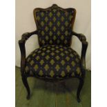 A French style upholstered mahogany armchair on cabriole legs