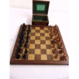 The Staunton Chessmen ebony and boxwood set circa 1890 in fitted wooden case and a wooden chess
