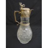 A Victorian hobnail cut glass claret jug, the silver collar chased with masks and fruit with leaf