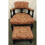 An Edwardian upholstered occasional chair with matching foot stool
