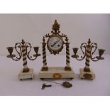 A French marble and gilded metal clock set flanked by two branch candelabra, white enamel dial,