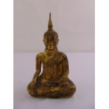 A gilt metal cast figurine of seated Buddha, 29.5cm (h)