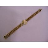 9ct yellow gold ladies wristwatch on a 9ct two colour gold bracelet, approx total weight 25.9g