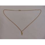 9ct yellow gold necklace with a 9ct gold charm , approx total weight 7.0g