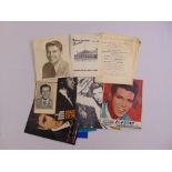 A quantity of ephemera to include an autograph book with signed photographs of Frank Sinatra, Ronald