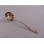 A silver rattail soup ladle, London 1921