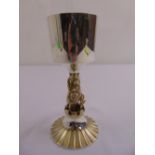 A limited edition silver and silver gilt goblet with cast lion stem, raised and fluted circular