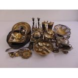 A quantity of silver plate to include candlesticks, dishes and flatware