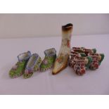 Three Victorian bocage ceramic shoes, a Masons ironstone boot and a set of five miniature