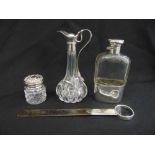 A quantity of silver to include a hip flask, a glass flagon with silver mounts, an Aspeys