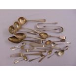 A quantity of silver flatware to include spoons, forks, ladles and tongs (22)