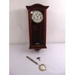 Hermle mahogany cased wall regulator, white enamel dial with Roman numerals, to include keys and