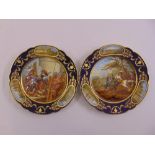 A pair of Sevres hand painted cabinet plates with historical scenes to the base, marks to the bases