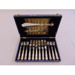 A cased set of Kings pattern silver plated fish eaters for 6 place settings