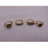 Four 9ct yellow gold rings set with various precious and semi-precious stones, approx total weight