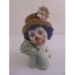 A Lladro figurine of a clown with curly hair and hat serial no. 5542